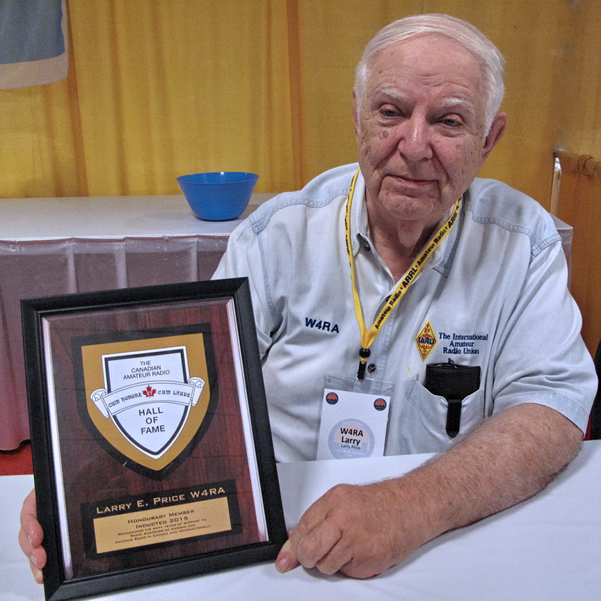 Larry E. Price, W4RA, with Canadian Amateur Radio Hall of Fame plaque.