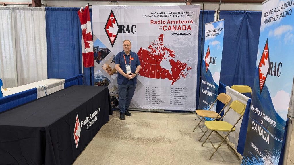 RAC President Al Boyd, VE3AJB, at the RAC Booth at Dayton.